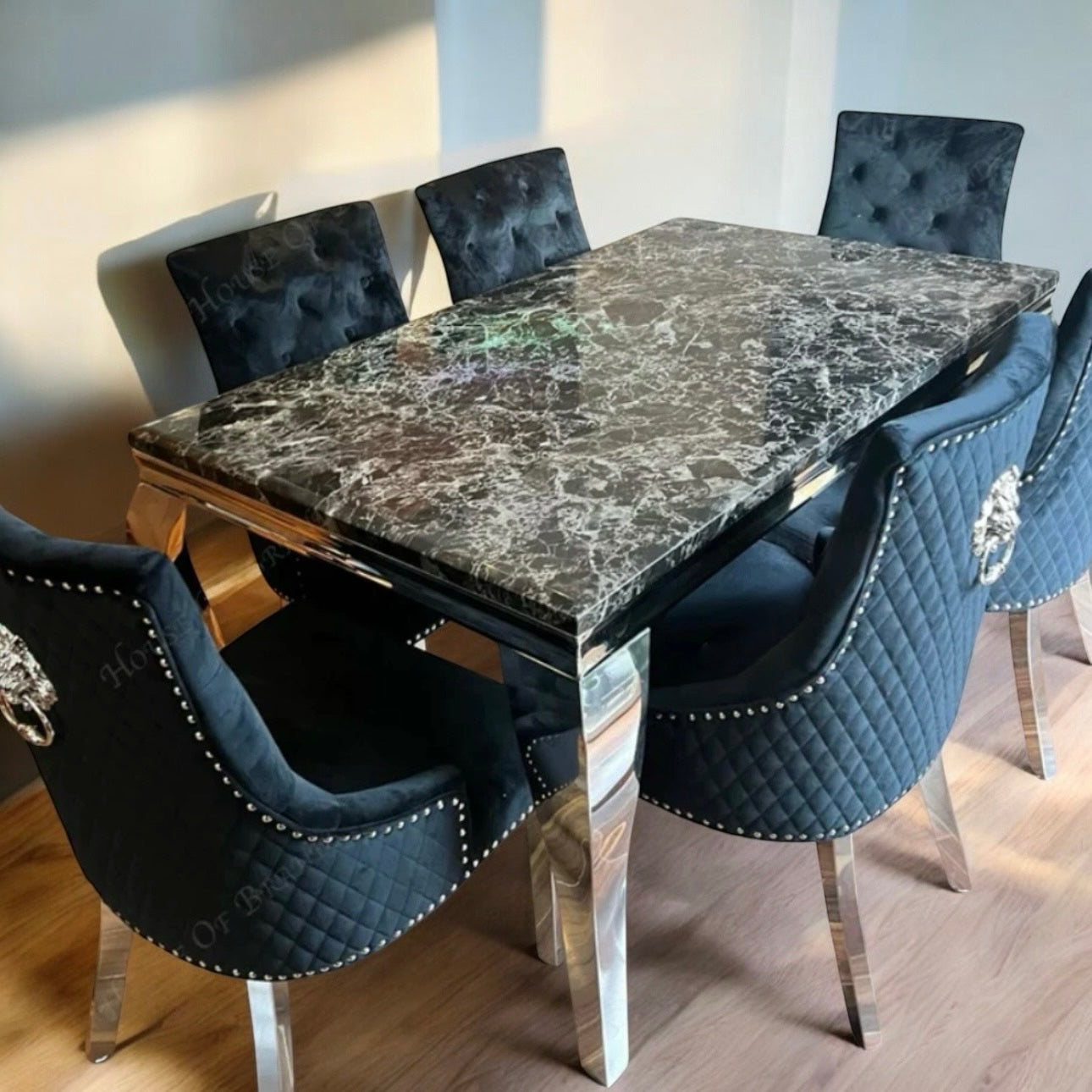 Louis black marble dining set with Mayfair lion knocker chairs