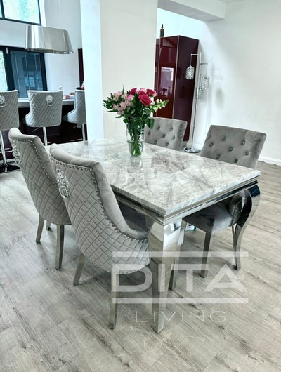 Louis marble dining table with mayfair lion knocker chairs