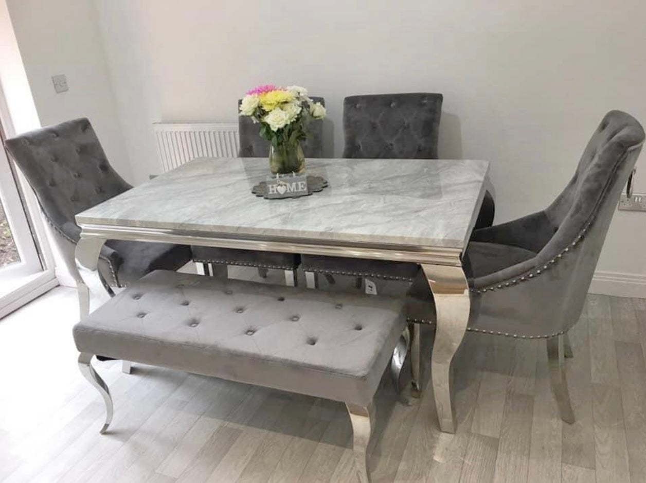 Louis marble dining table with Cambridge Knocker chairs